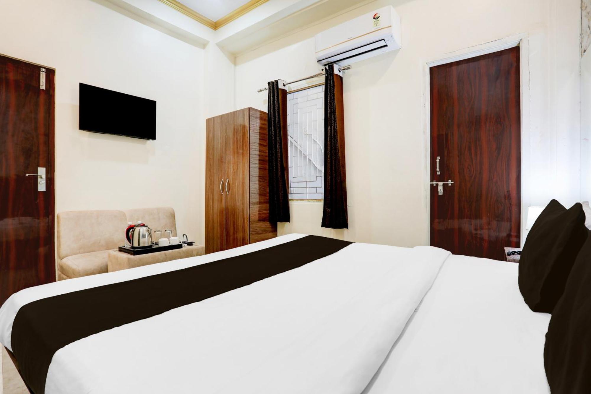Super Hotel O Sankat Mochan Gandhi Nagar Kakarmatha Extérieur photo