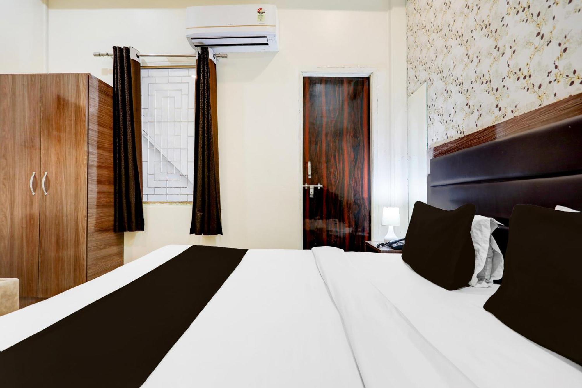 Super Hotel O Sankat Mochan Gandhi Nagar Kakarmatha Extérieur photo